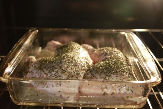 Seasoned chicken breast. Ready for roast in oven