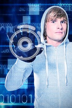 Man with black gloves staring at camera against blue technology design with binary code