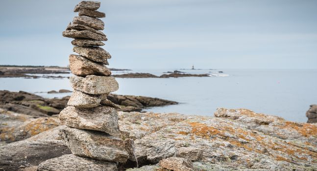 cairn on a hiking trail on the island of Yeu, France