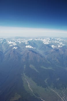 Aerial view of Clouds through flight window