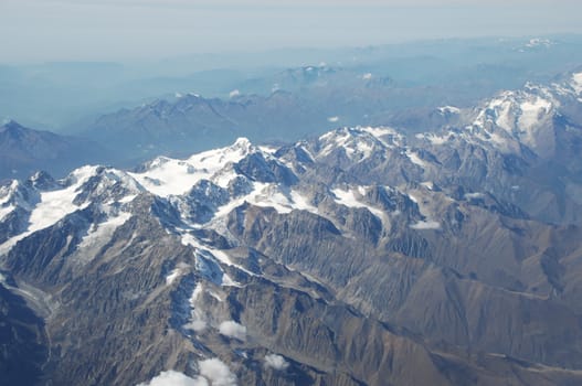 Aerial view of Clouds through flight window