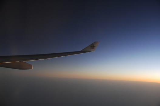 Aerial view of Clouds through flight window