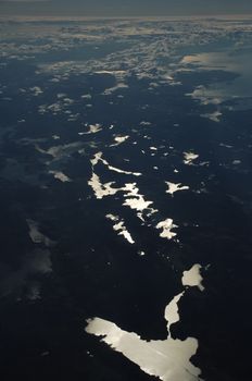 Aerial view of Clouds through flight window