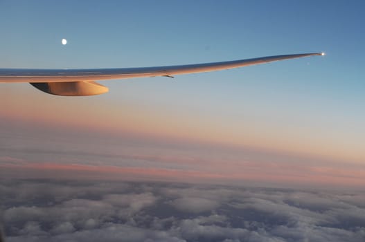 Aerial view of Clouds through flight window