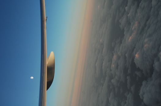 Aerial view of Clouds through flight window
