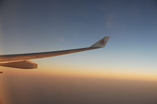 Aerial view of Clouds through flight window