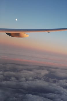 Aerial view of Clouds through flight window