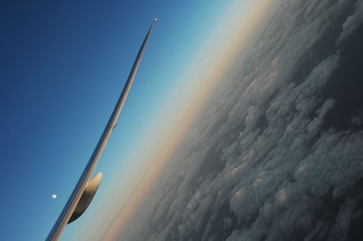 Aerial view of Clouds through flight window