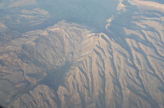 Aerial view of Clouds through flight window