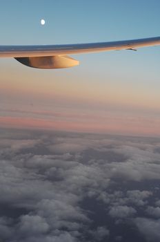 Aerial view of Clouds through flight window