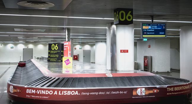 Lisbon, Portugal - August 7, 2018: View of luggage treadmill in Lisbon International Airport on arrival on a summer day