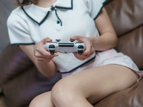 Crop of woman playing console games, Woman enjoying in video games.