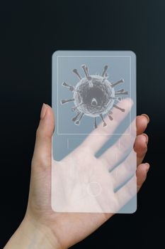 Hand holding and showing virus on smartphone. Covid-19