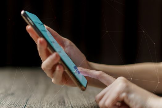 Woman hand holding smartphone. Payment and 3D Connection