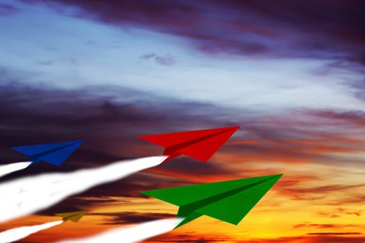 Challenge concept, competition paper plane on sky background