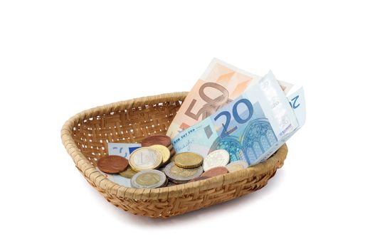 A little basket with money, making a collection during the Holy Mass