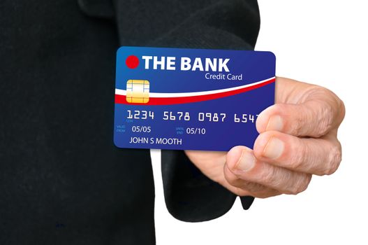 A man holding a credit card in his hand, and showing it