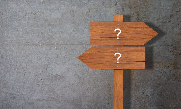 Business problem or confused concept, wooden sign on concrete background
