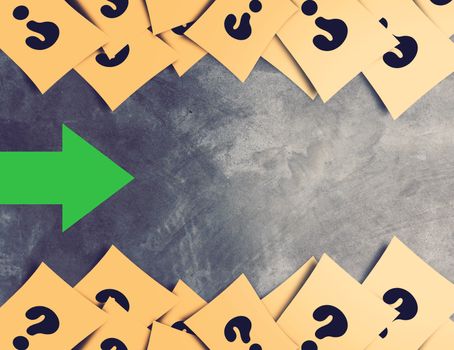 Business solution, problem concept, yellow paper and green arrow on vintage and retro background
