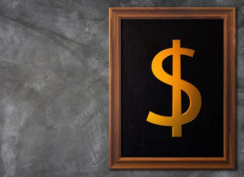 Financial success concept, gold dollar currency symbol and wooden frame