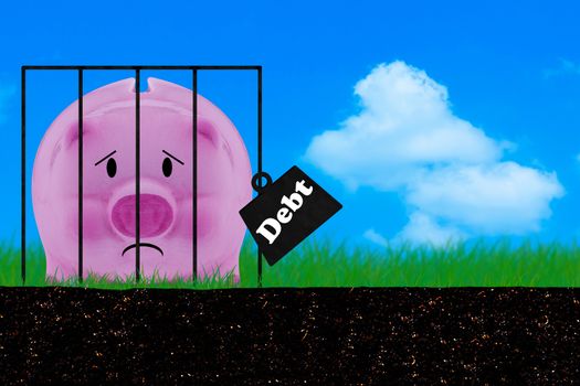 Debt concept, financial crisis, piggy bank on blue sky background