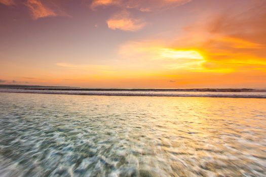 Glowing majestic sunset over tropical sea, beautiful natural background