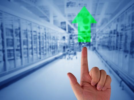 Business or idea growth concept, green arrow and hand on blur background, financial increase market profit, nature and ecology