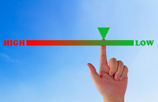 Risk assessment, management planning concept, hand and level bar on blue background