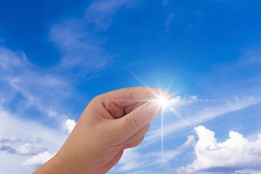 Business success concept, hand holding the shiny star, growth and achievement 