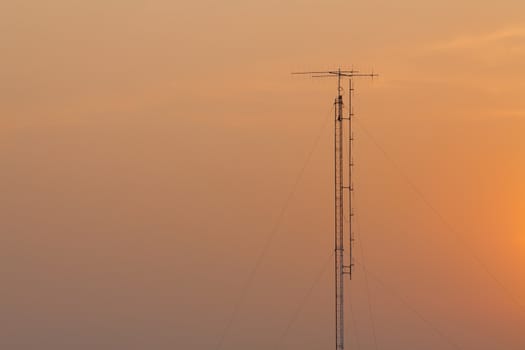 communication antenna twilight sky background