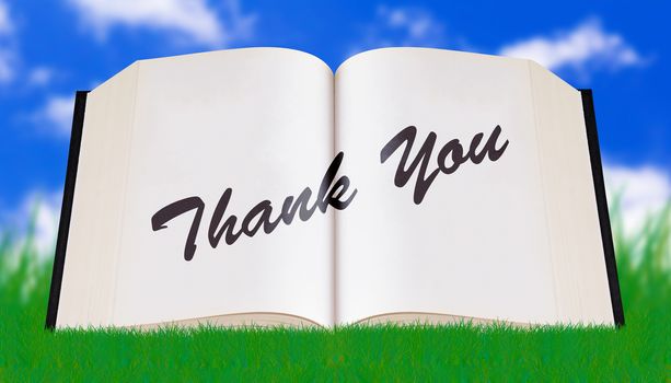 Word thank you concept on open book 