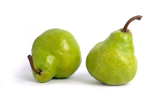 Two green Packham pears fruit isolated on white background