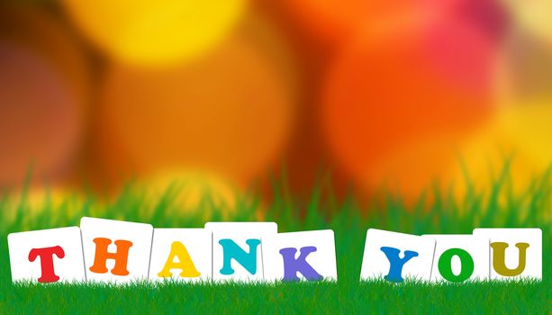 Word thank you concept on green grass background