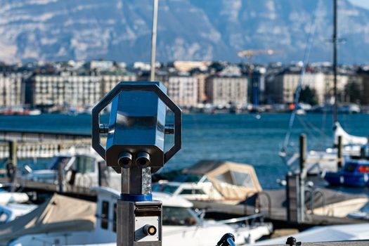 Tourist binoculars on the shores of Lake Geneva, Geneva, Switzerland - image