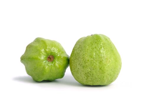 Two green crystal guava fruit isolated on white background