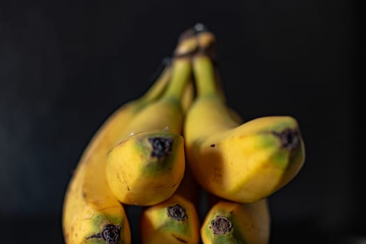 Group of bananas on a black background