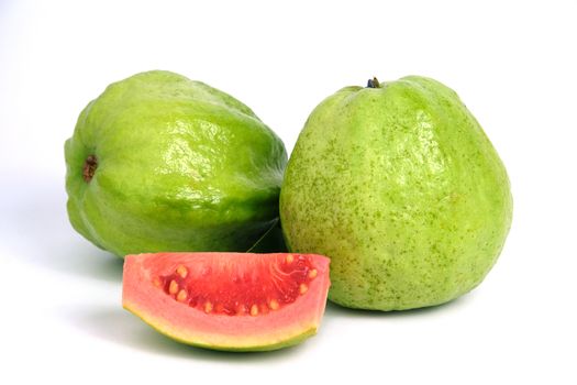 Fresh Psidium guajava / common guava / lemon guava sliced and raw fruit isolated on a white background