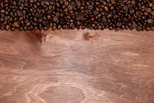 Coffee beans stripe on dark wooden texture background, Copyspace for text - image