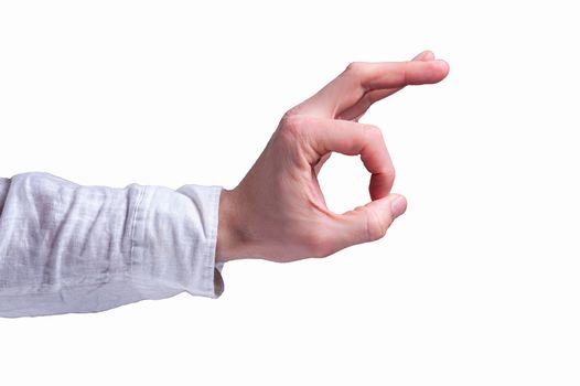 Hand of a man in a white shirt shows the OK or ring gesture sign on isolated white background