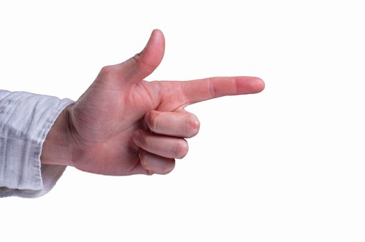 Hand of a man in a white shirt shows the finger gun sigh on isolated white background