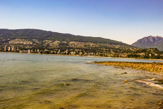 Sea walk at the Kitsilano Beach Park at Downtown of Vancouver, Canada..