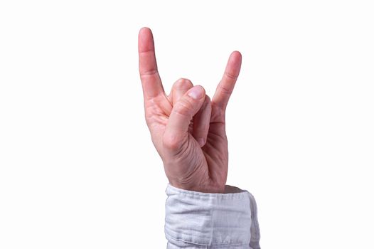 Hand of a man in a white shirt shows The sign of the horns on isolated white background