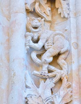 Devil carved on the facade of the cathedral of Salamanca in Spain