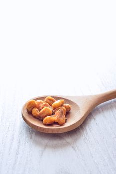 Toasted corn on the wooden table in the kitchen.