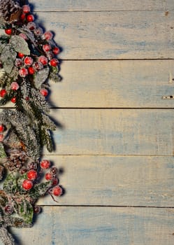 Christmas decorations over old wooden table.