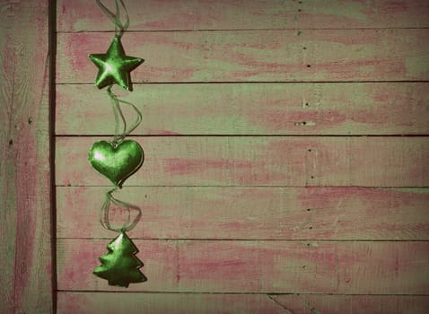 Christmas decorations over old wooden table.