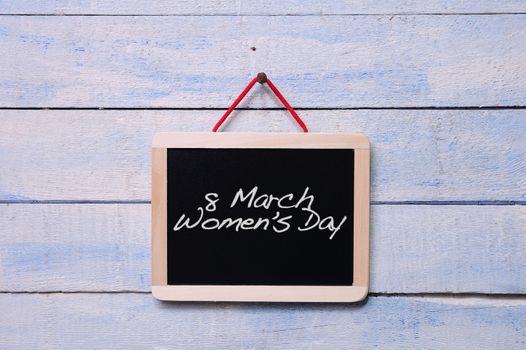 Blackboard with phrase, 8 march womens day.