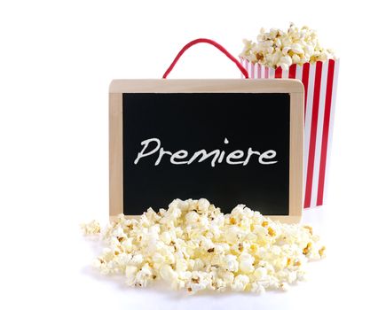 Popcorn and blackboard with the word Premiere.