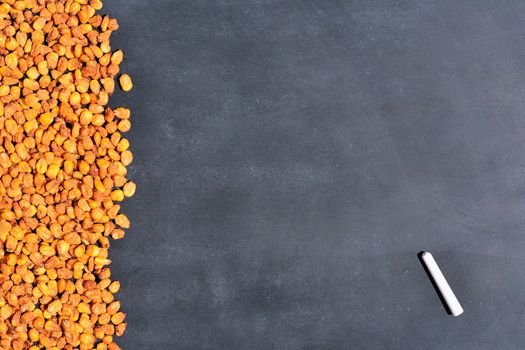 Toasted corn on the blackboard in the kitchen.