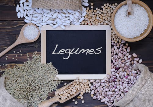 Legumes on wooden table in the kitchen